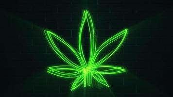 Glowing green neon light cannabis leaf background animation with flowing particles and light beams. This motion background is full HD and a seamless loop. video