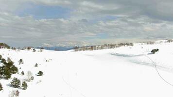 Beautiful Winter Mountain Landscape on a Cloudy Day Aerial Shot. Ski Resort Top View. video